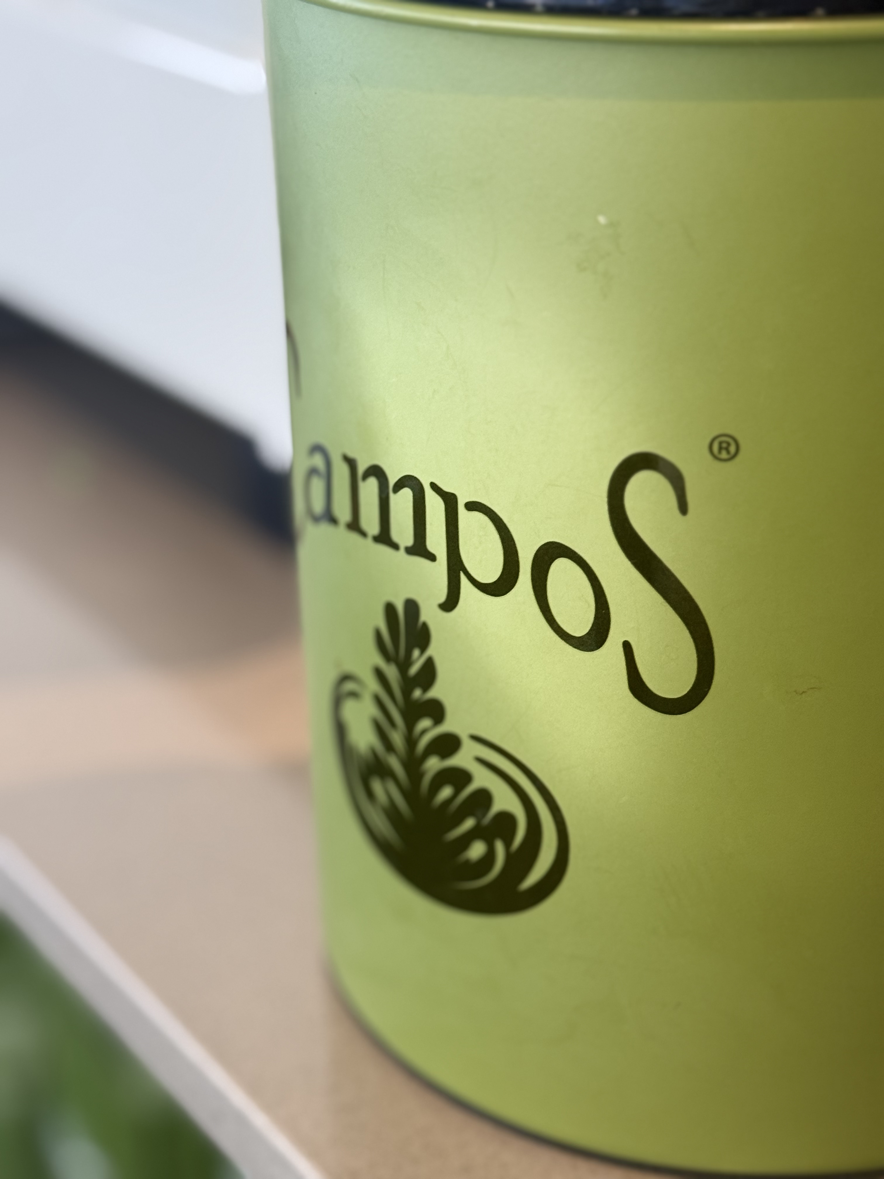 Campos coffee tin on the counter